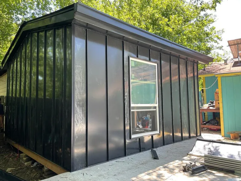 Black standing seam metal wall panels for Roof Inspection in Arcadia